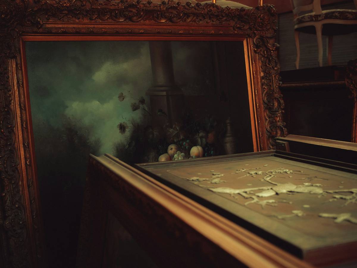 antique still life paintings featuring a 17th-century oil painting of fruit and glassware on a wooden table